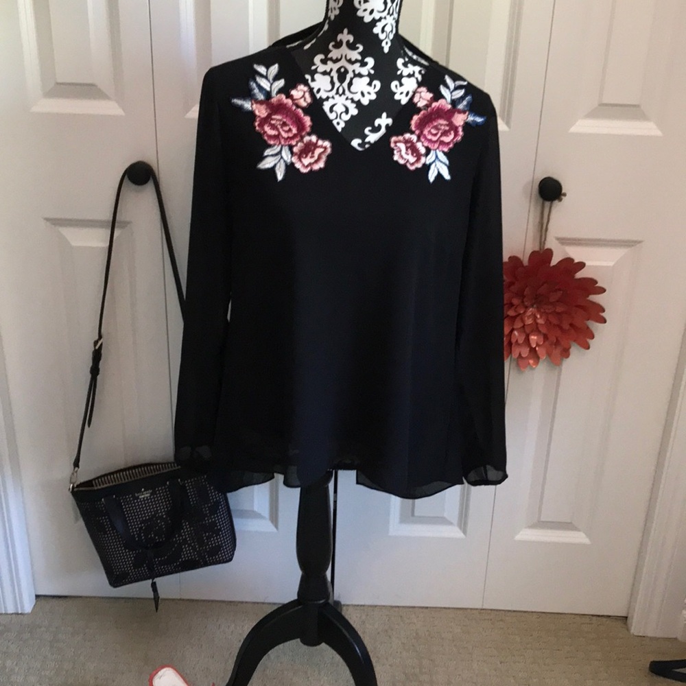Flowy black blouse with open back and back ties